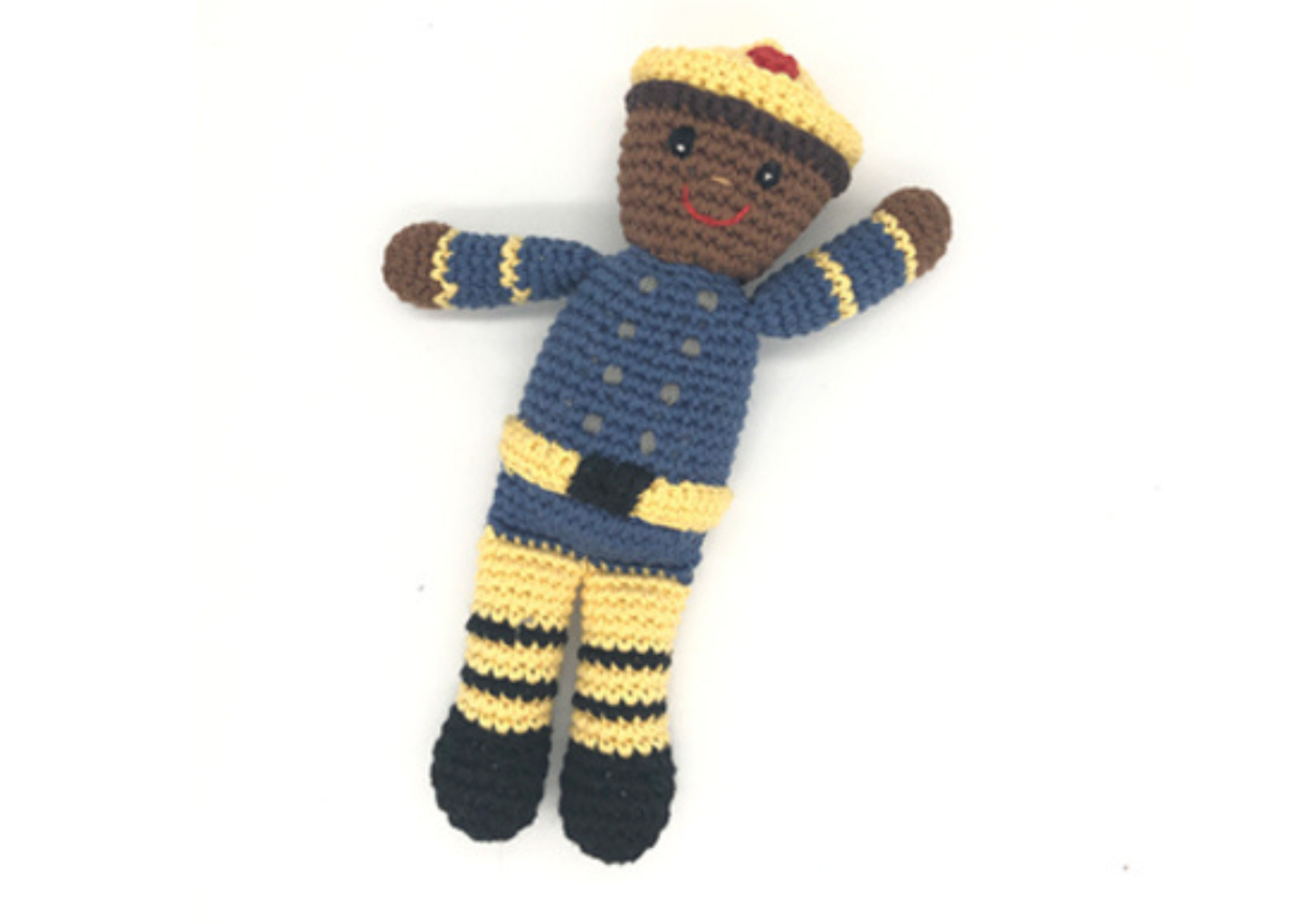 A crochet baby toy rattle designed as a firefighter, with a predominantly blue uniform with yellow accents and a black belt.