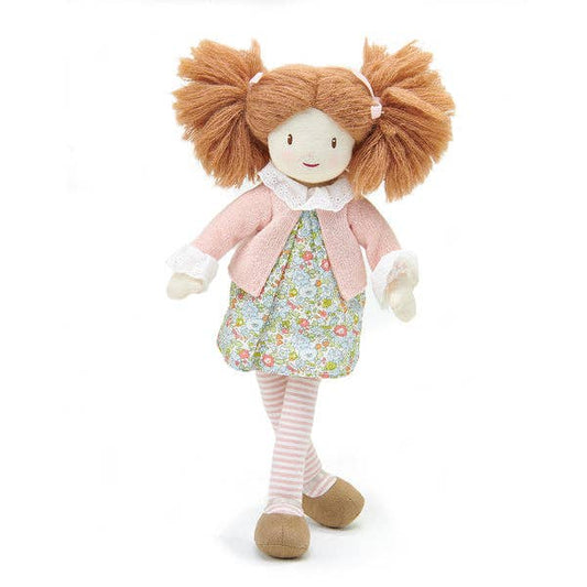 Stuffed doll with red hair, floral dress, and pink jacket on a white background