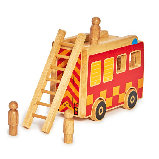 Wooden toy fire truck with ladder on a white background