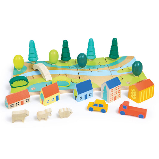 Colorful wooden toy set with houses, cars, animals, and a landscape on a white background