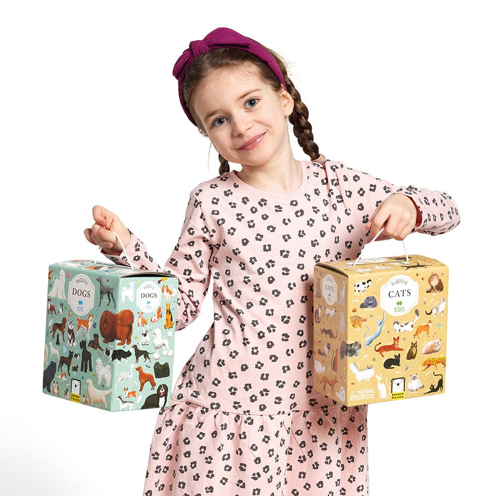 Young girl holding two boxes, one with dog illustrations and the other with cat illustrations, on a white background.