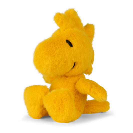 Yellow Woodstock plush toy on a white background