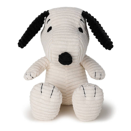 Plush Snoopy toy resembling a black and white dog with a corduroy texture on a white background