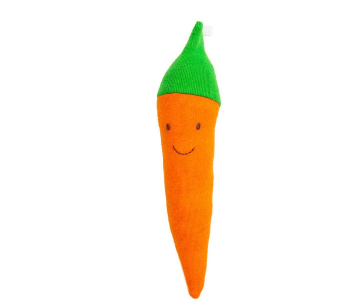 Carrot-shaped toy with a green top on a white background