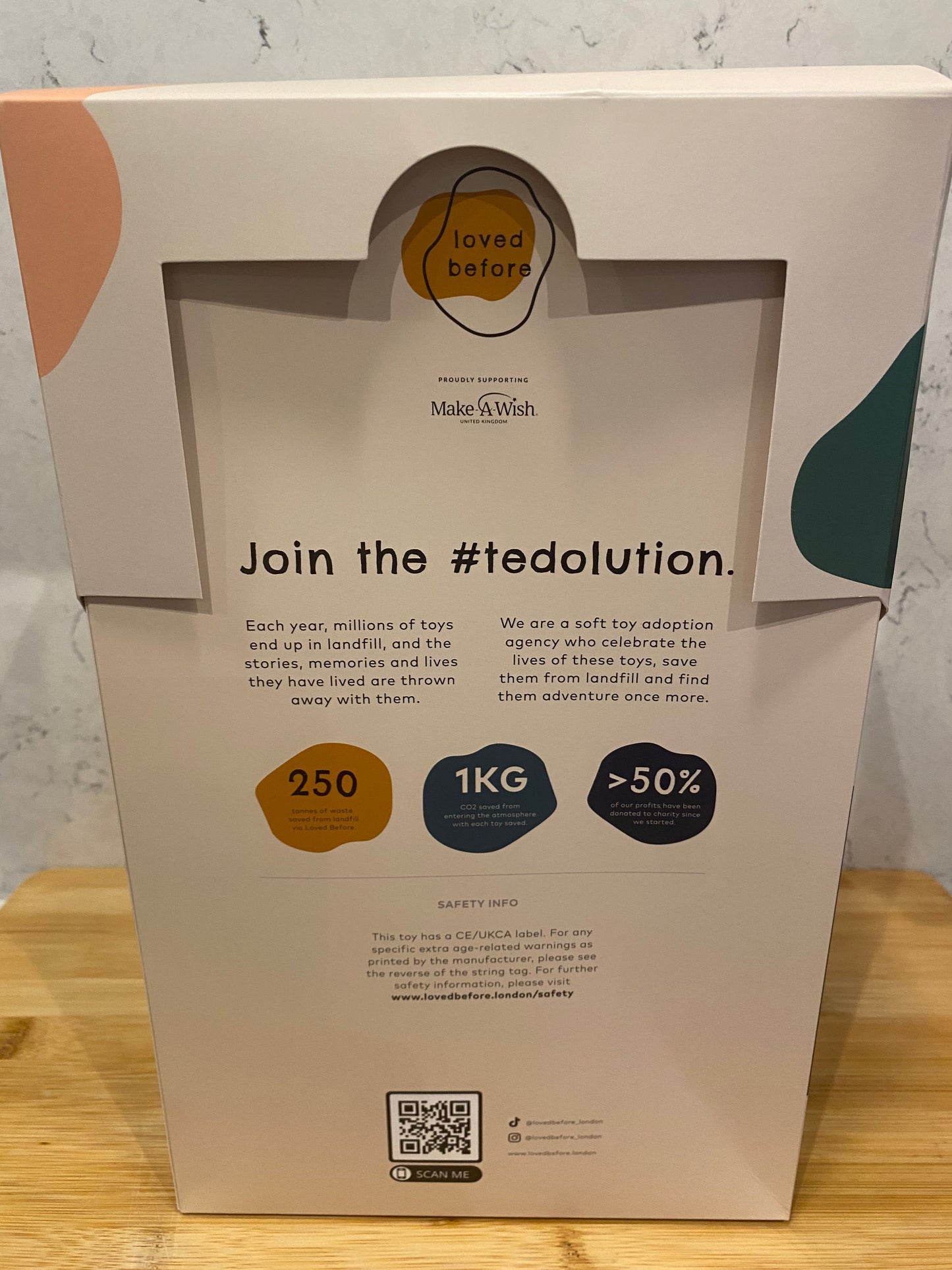 Product packaging with text and graphics on a light surface