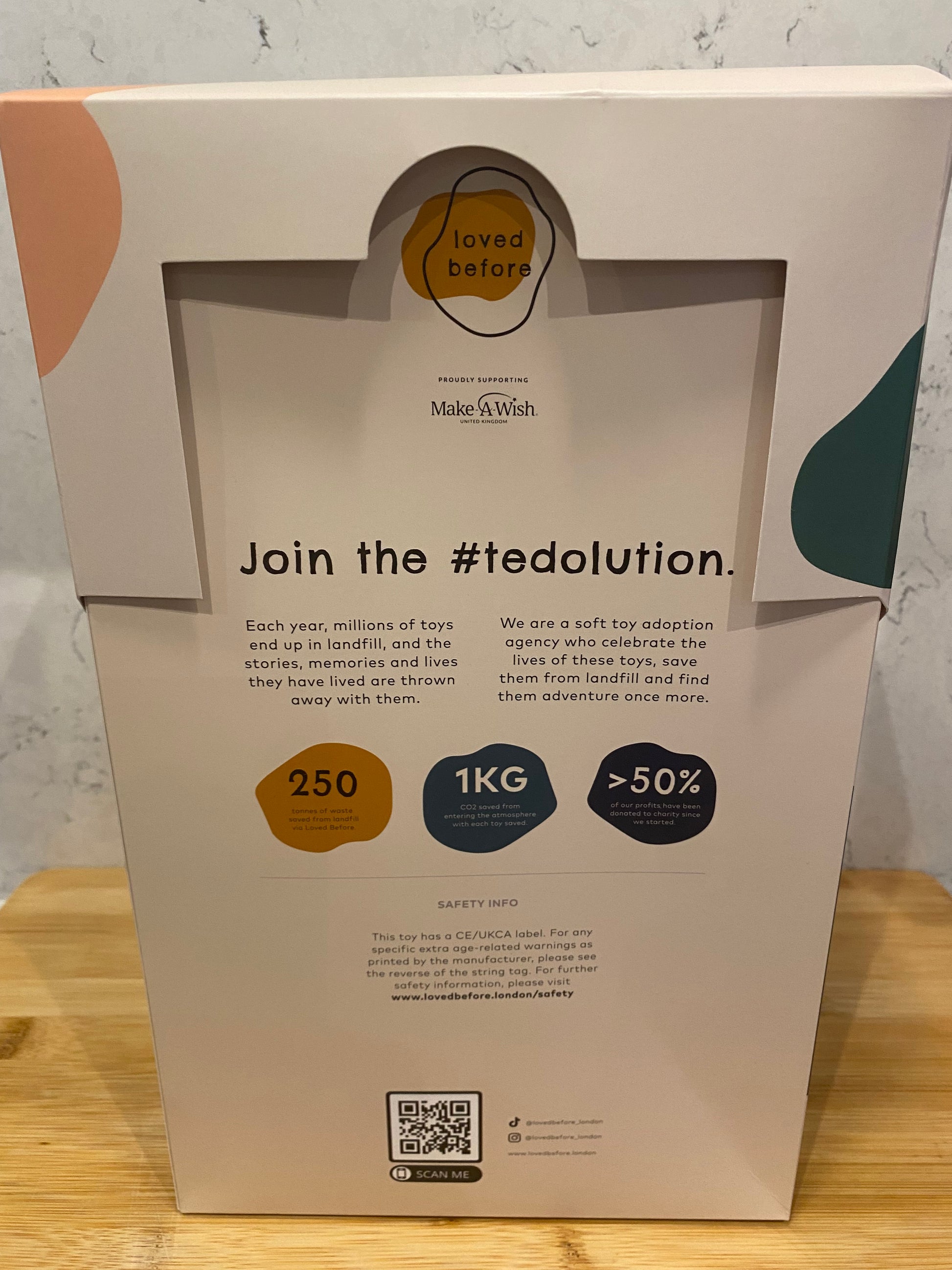 Product packaging with text and graphics on a light surface