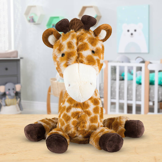 Plush giraffe toy on a wooden surface with a nursery in the background