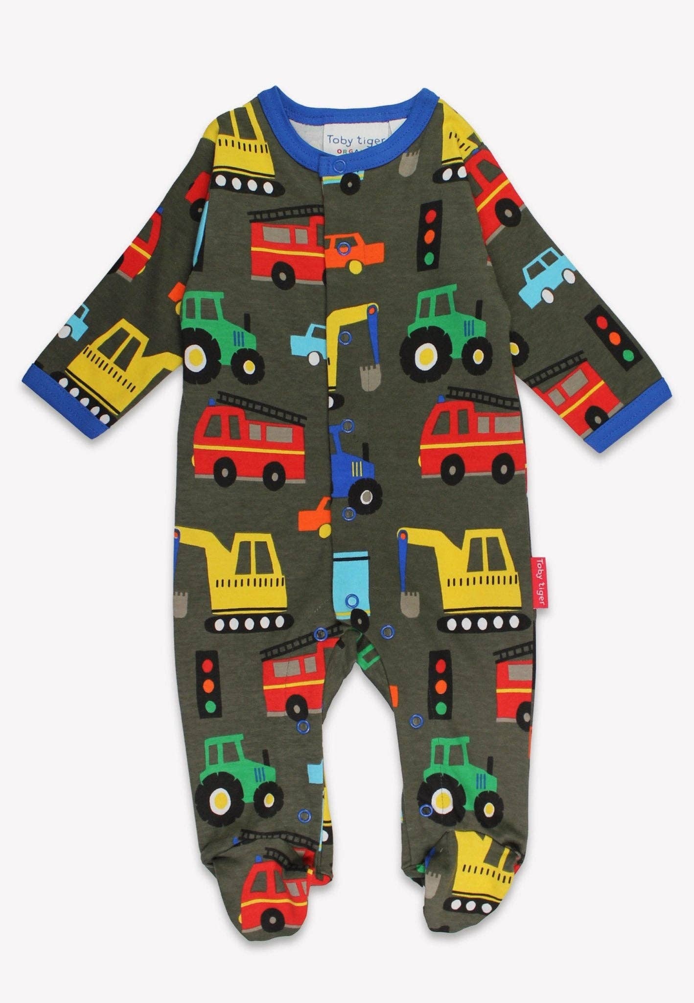 Children's onesie with vehicle pattern on a white background