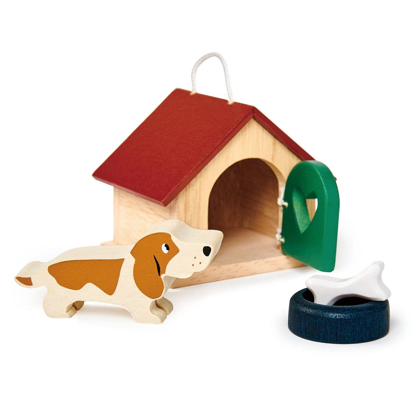 Wooden doghouse with a toy dog and tire swing on a white background