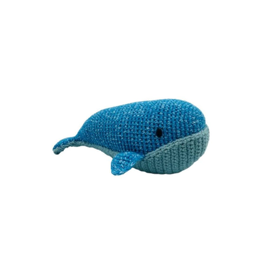Knitted whale toy on a white background