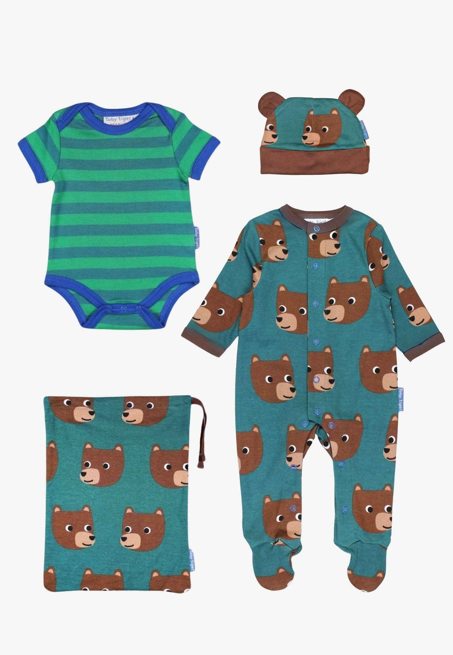 Set of baby clothing including a onesie, bodysuit, and hat with bear pattern on a white background.