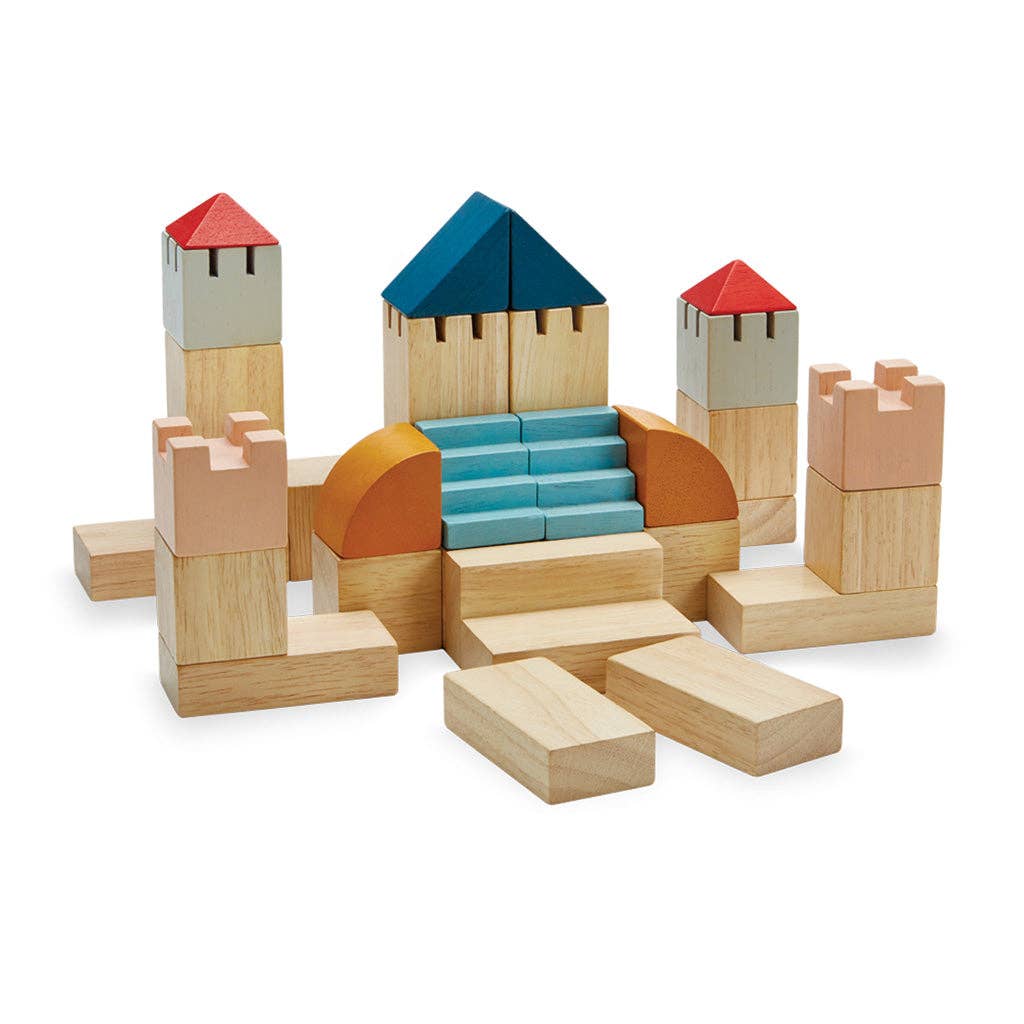 Wooden building blocks set on a white background