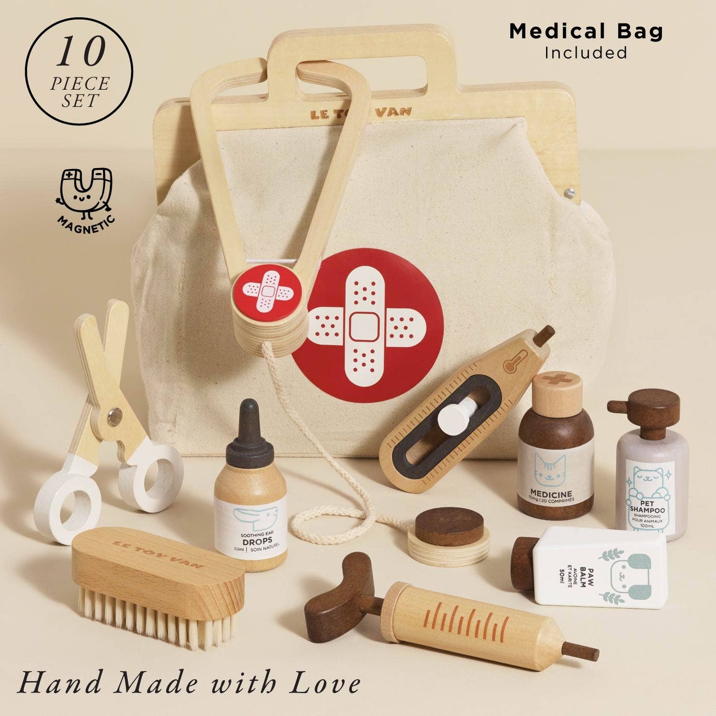 Set of animal care items with a medical bag on a beige background