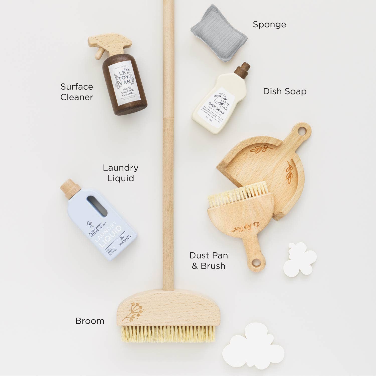 Wooden toy cleaning supplies including a broom, surface cleaner, laundry liquid, dish soap, and dust pan on a white background.