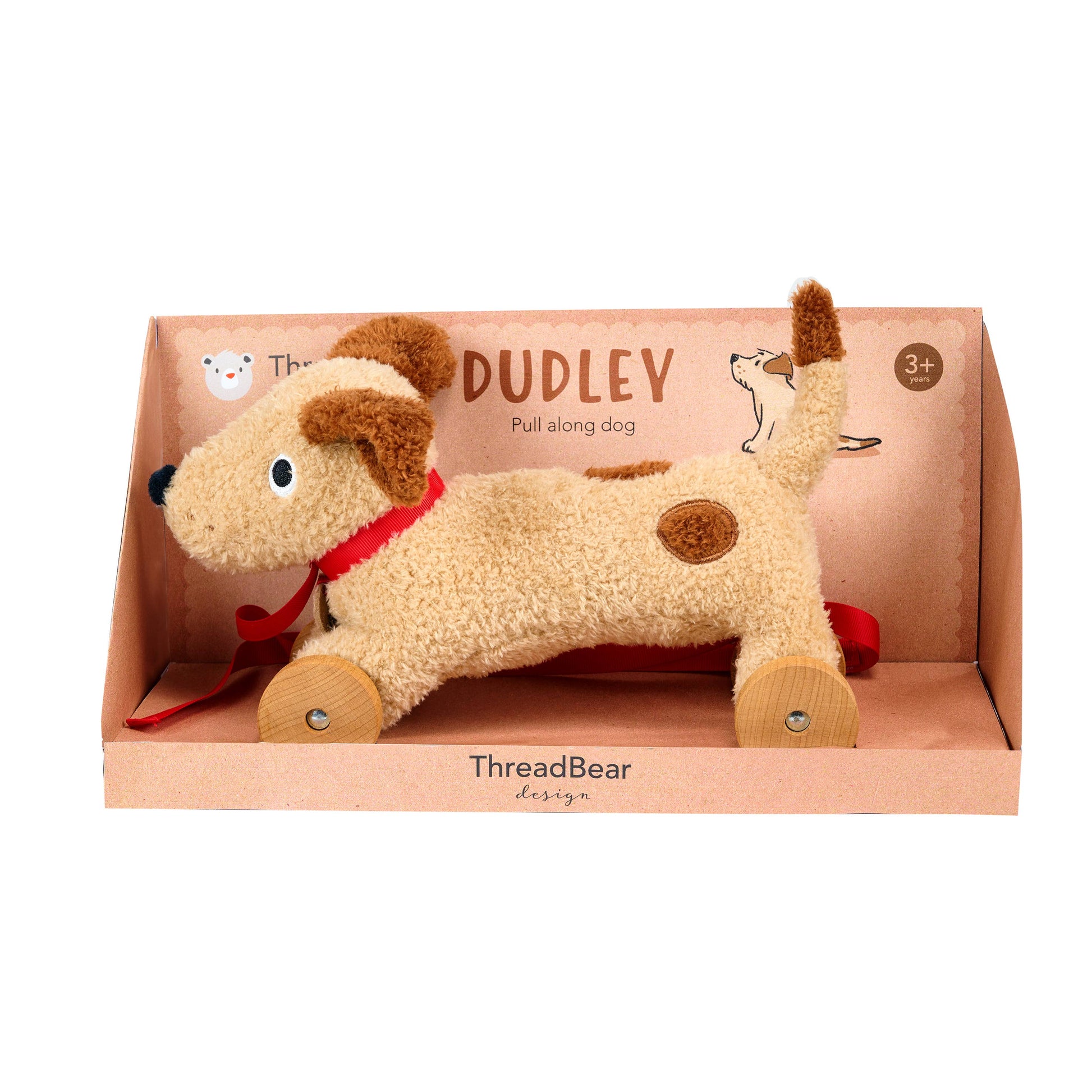 Plush pull-along dog toy with red leash in packaging, brand 'ThreadBear' visible