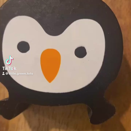 Tik Tok video of wooden penguin mother and baby wooden toy