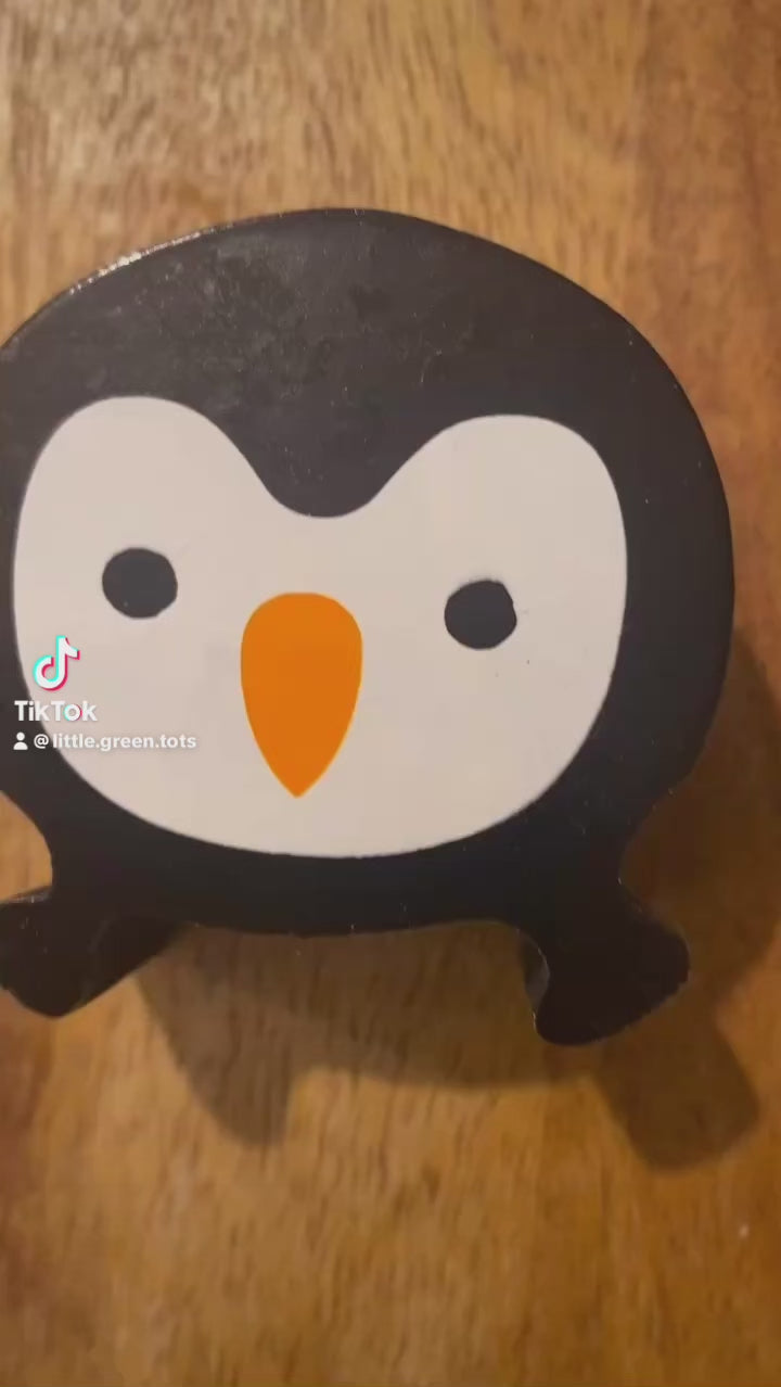 Tik Tok video of wooden penguin mother and baby wooden toy
